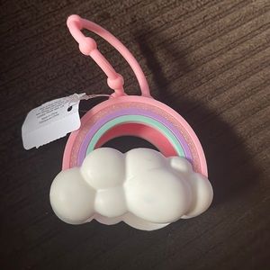 Bath & Body Works rainbow on clouds hand sanitizer holder. Brand new very cute.